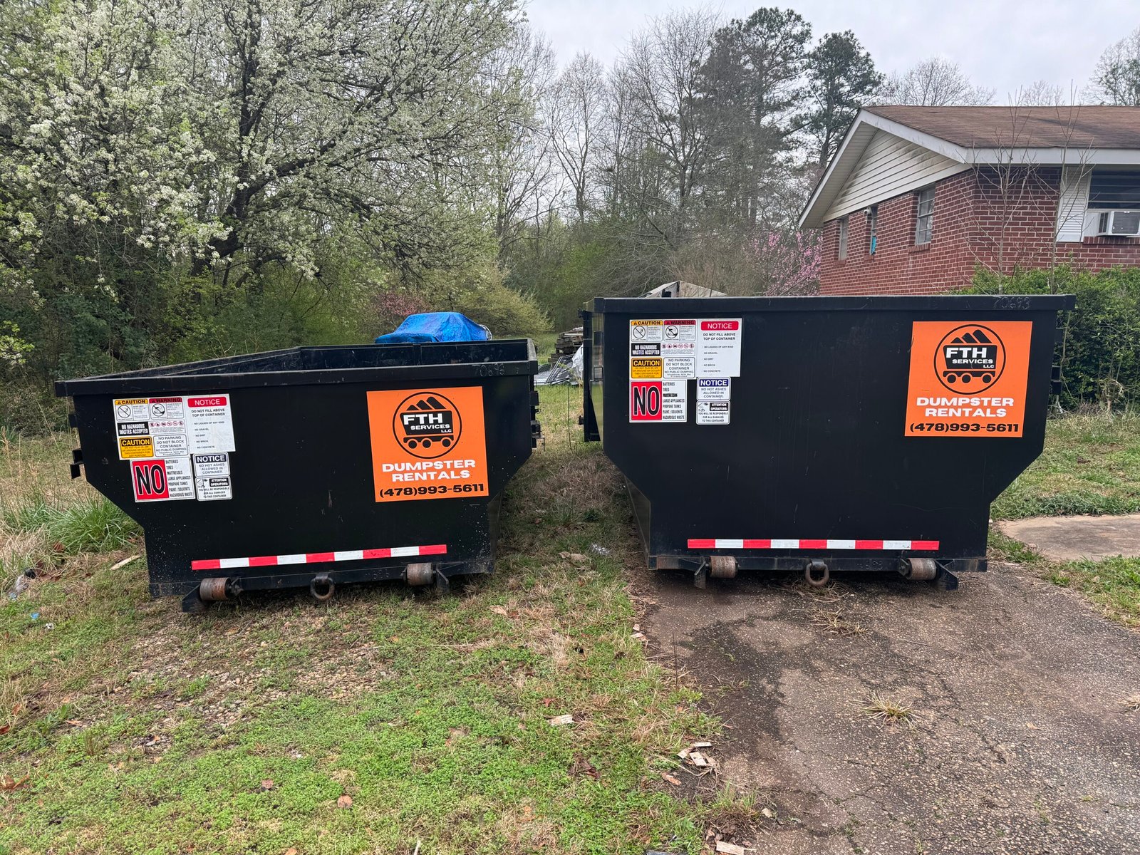 Two FTH Services roll-off dumpsters delivered for a residential project in Macon, GA