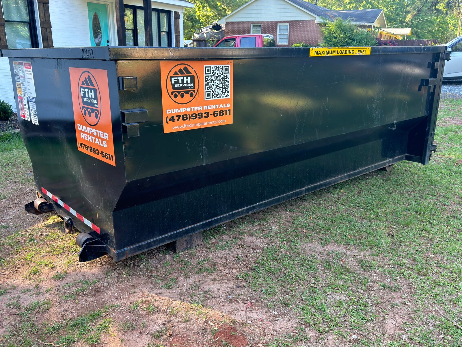 FTH Services 20-yard roll-off dumpster rental for a residential project in Griffin, GA