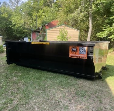 A residential dumpster provided by FTH Services and place on the customers yard. This dumpster was located in Barnesville GA.