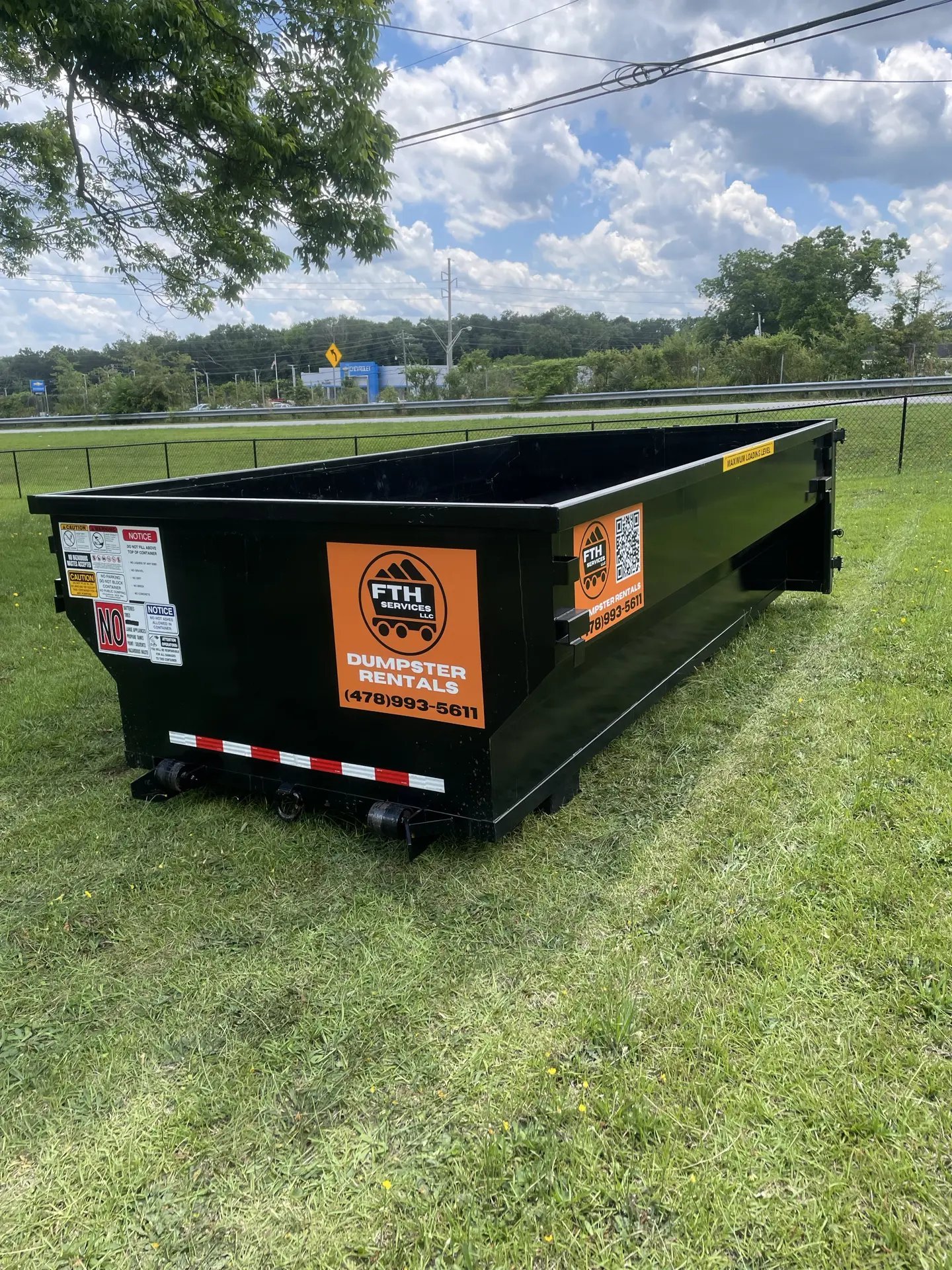 Roll off dumpster placed for a residential cleanup by FTH Services.